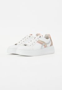 White sneakers with a chunky sole, featuring metallic accents in gold, silver, and pink, and a textured design on the sides.