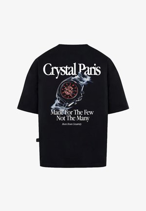Black cotton t-shirt featuring a graphic print of a watch with red accents, text reading "Crystal Paris" and "Time Never Stops" on the back.