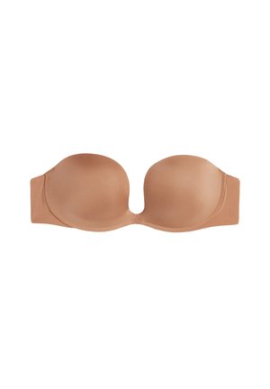 Nude strapless bra with smooth, molded cups, a rounded shape, seamless design, and side wings for support. Made from soft, stretchy fabric.