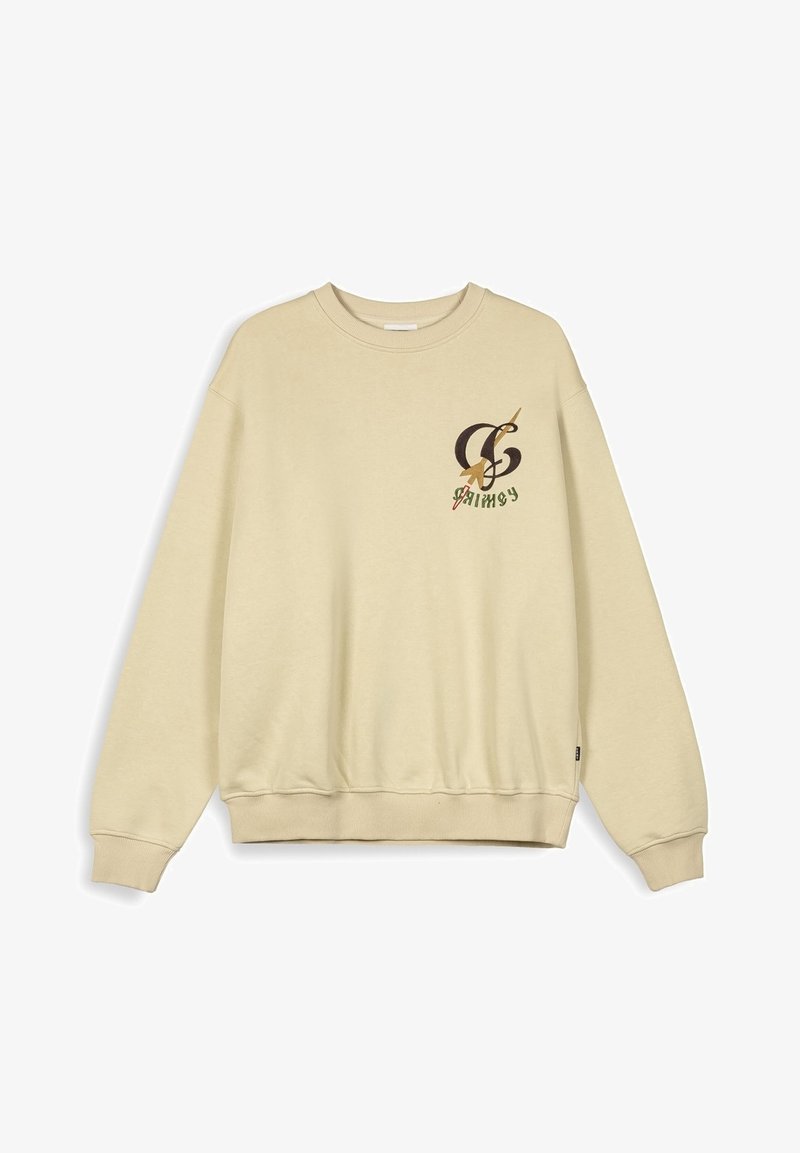 Biały sweter w kolorze kremowym z okrągłym dekoltem, długimi rękawami, prążkowanymi mankietami i dolnym wykończeniem. Posiada graficzny wzór na lewej piersi.