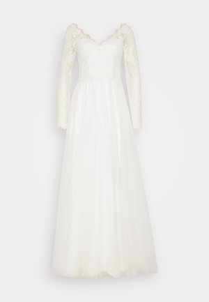 Vestido de novia de manga larga blanco con un corsé de encaje y un escote con volantes, además de una falda de tul fluida. Acentos de encaje texturizado por toda la prenda.