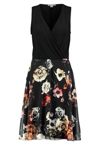 Robe noire sans manches avec un décolleté en V et un corsage ajusté, se transformant en une jupe fluide ornée d'un motif floral coloré.