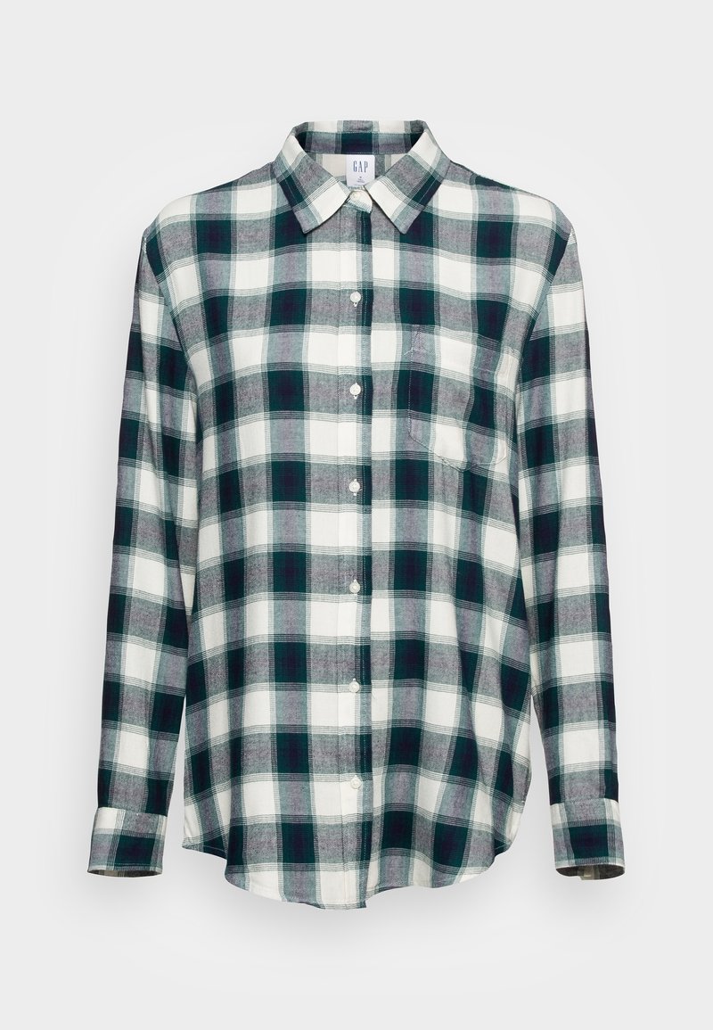 Chemise à manches longues boutonnée avec motif à carreaux vert et blanc et une poche poitrine, présentée sur un fond clair uni.