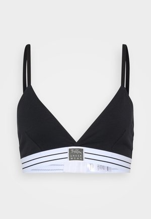 Zwarte bralette met een diepe halslijn, dunne bandjes en een elastische band met witte strepen en een logolabel aan de voorkant.