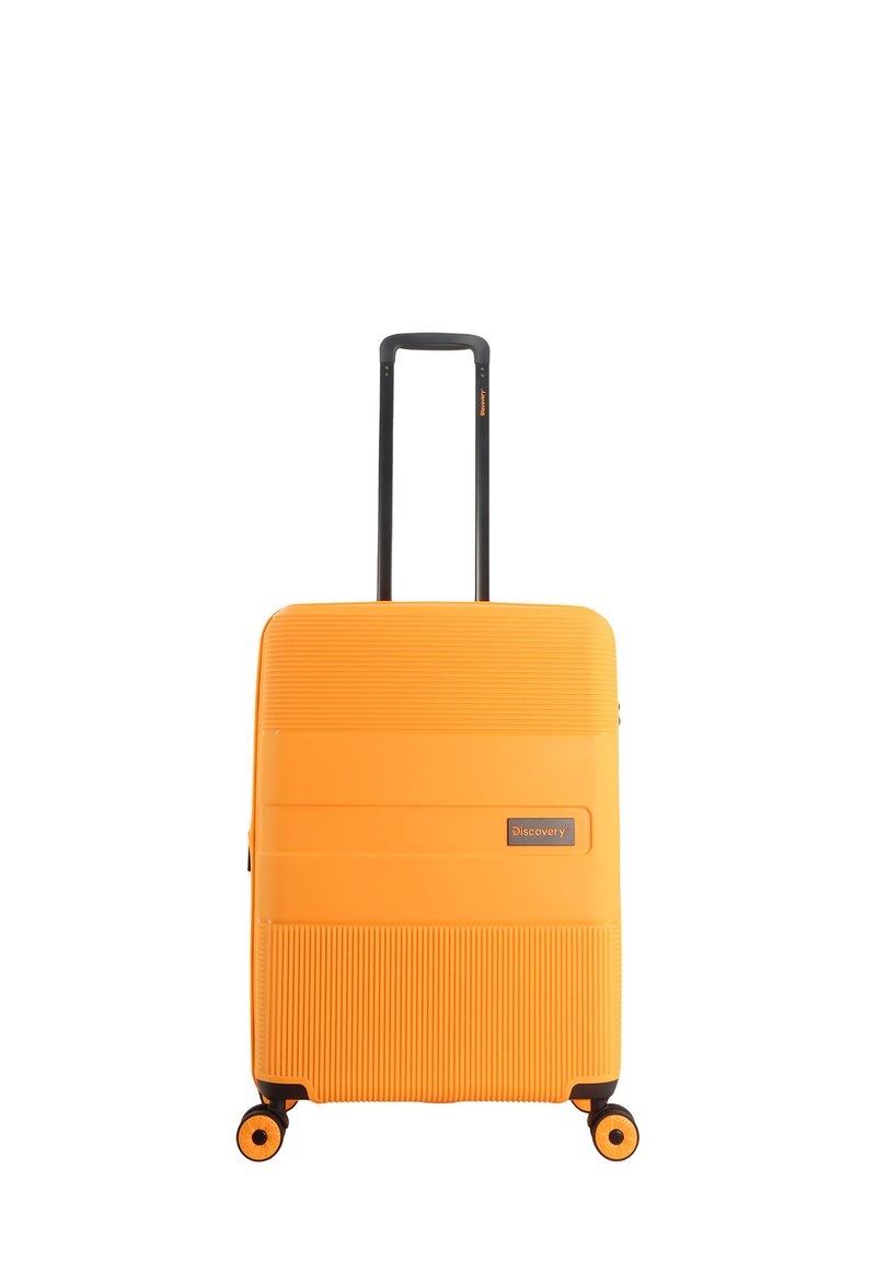 Hard-shell orange suitcase with horizontal ribbed texture, black telescopic handle, and four black wheels for mobility. Brand label visible.
