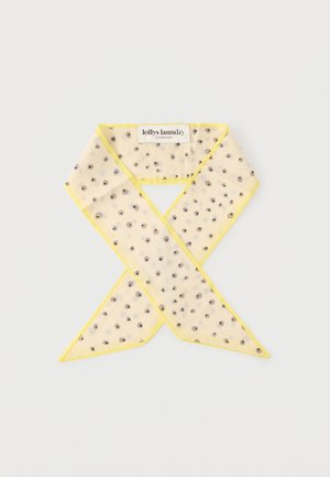 Foulard léger jaune pâle transparent avec petits pois noirs et bords jaune vif, plié en forme de X avec l'étiquette "lollys laundry" visible.