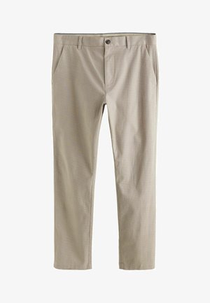 Beżowe spodnie wykonane z teksturowanej tkaniny, z zapięciem na guzik, dwoma przednimi kieszeniami i prostym krojem nogawki.