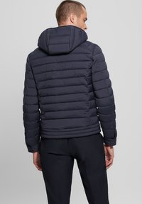 Guess SUPER-STRETCH - Giacca invernale - blau