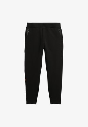 Pantaloni jogger neri con gamba affusolata, vita elastica e tasche con zip; presenta un logo sottile arancione sul lato.