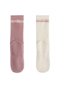 Eine rosa und eine weiße rutschfeste Socke, jeweils mit zwei horizontalen Streifen nahe der Oberseite, nebeneinander auf weißem Hintergrund dargestellt.