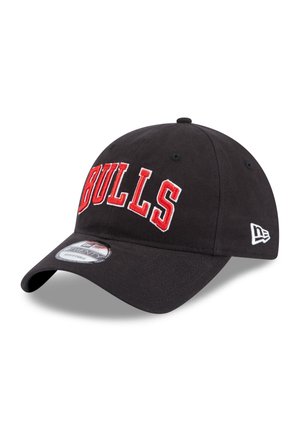 Black baseball cap with red "BULLS" embroidery on the front, curved brim, and adjustable back strap; features logo on the side.
