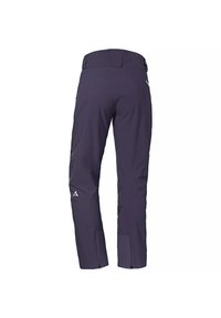 Marina vattenavvisande skidbyxor med slim fit, dragkedjefållar och förstärkta knän. Har en logotypdetalj på det nedre benet och en mjuk textur.