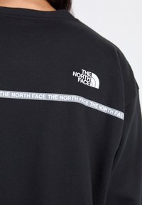 The North Face ZUMU CREW - Melegítőfelső - black