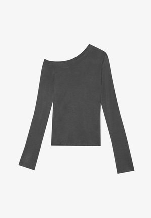 Haut gris à manches longues avec un design dénudé sur les épaules. Fabriqué en tissu doux avec une texture lisse et un ourlet droit.