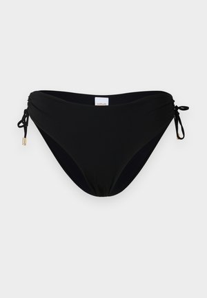 Μαύρο κάτω μέρος μπικίνι με ρυθμιζόμενα πλαϊνά κορδόνια με μικρές μεταλλικές λεπτομέρειες σε χρυσή απόχρωση σε απλό λευκό φόντο.