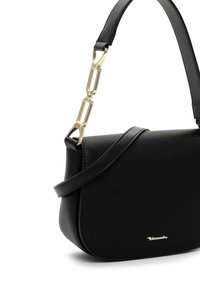 Black leather crossbody bag with a textured finish, curved shape, gold hardware accents, and a detachable link chain strap.