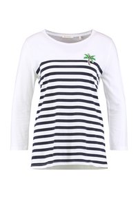 Camicia bianca a maniche lunghe con righe orizzontali blu navy, scollatura a barco e ricamo di una palma verde e argento sul lato sinistro.