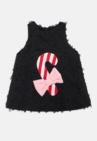 Black sleeveless dress with textured petal-like fabric. Features a red and white candy cane applique and a pink bow on the front.