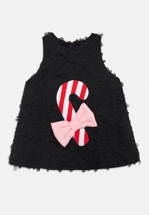 Black sleeveless dress with textured petal-like fabric. Features a red and white candy cane applique and a pink bow on the front.