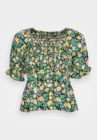 Blusa floral com fundo preto, apresentada com flores amarelas, verdes e roxas. Decote elástico e mangas bufantes com punhos franzidos.