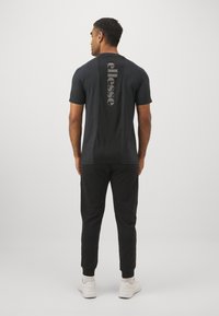 Ellesse UNASTAN PANT - Træningsbukser - black