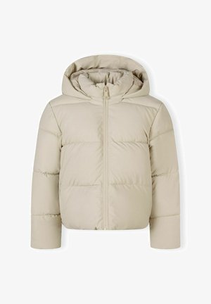 Veste matelassée beige avec fermeture à glissière et capuche. Elle présente un design matelassé, des manches longues et une texture douce.