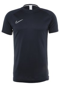 Navy blue short-sleeve athletic shirt with white Nike swoosh on right chest and subtle white stripe down sides.