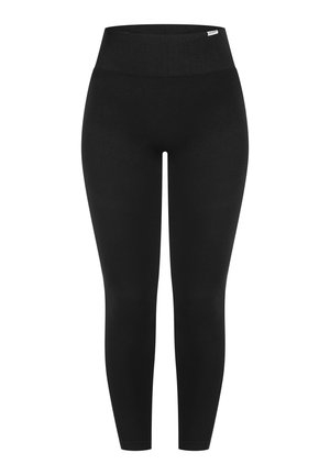 Leggings negros con una cintura alta. Fabricados con una tela suave y elástica. Largos hasta el tobillo, con una silueta ajustada y sin patrones o detalles visibles.