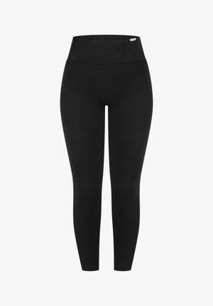 Leggings negros con una cintura alta. Fabricados con una tela suave y elástica. Largos hasta el tobillo, con una silueta ajustada y sin patrones o detalles visibles.