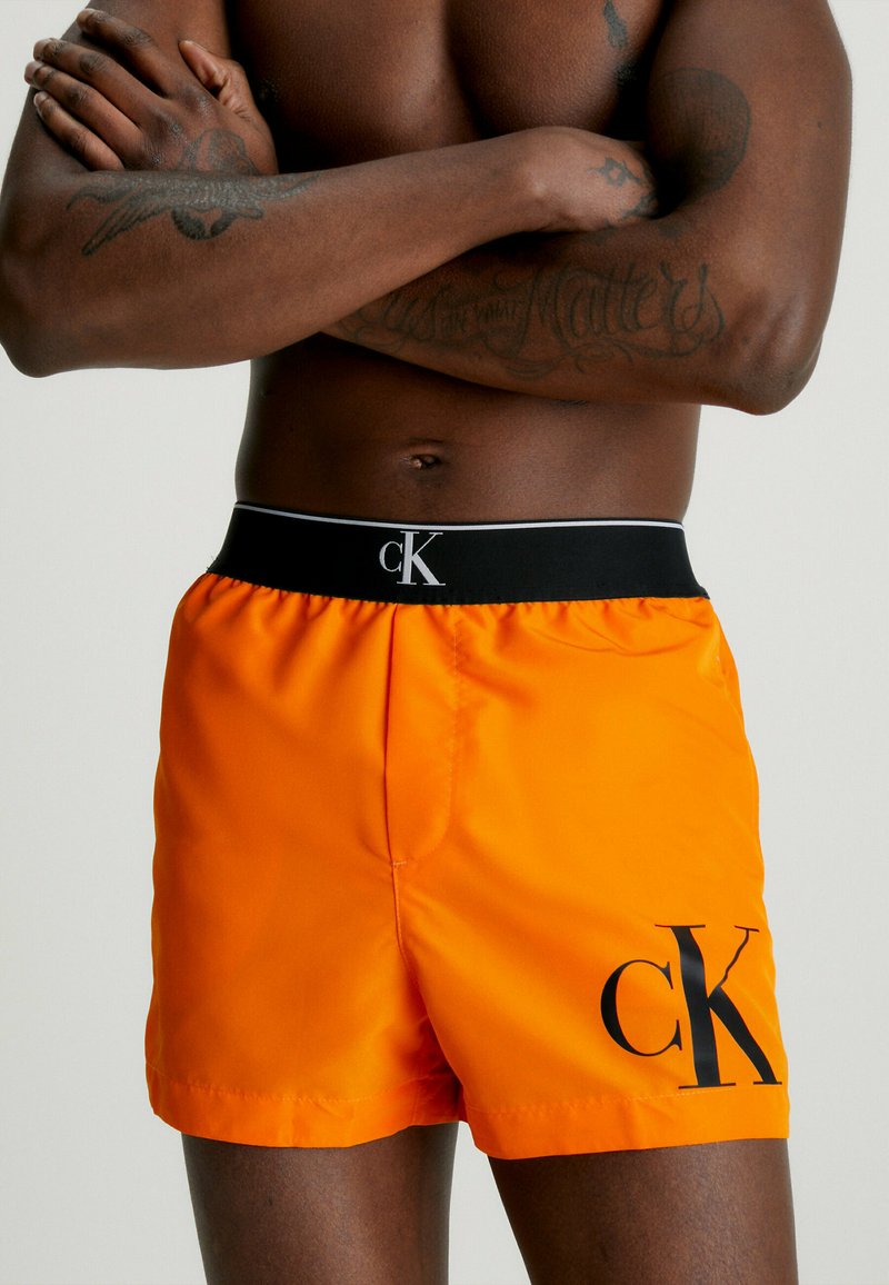 Calvin Klein Swimwear WAISTBAND Badeshorts sun kissed orange/orange