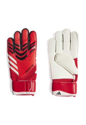 Gants de gardien rouges et blancs avec une prise texturée, présentant un motif en zigzag audacieux, une sangle de poignet réglable et un matériau rembourré.