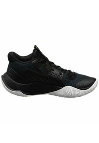Scarpa sportiva nera con tomaia in rete, dettagli testurizzati e suola in gomma bianca con un motivo a onde. Dettaglio del logo dorato sulla linguetta.