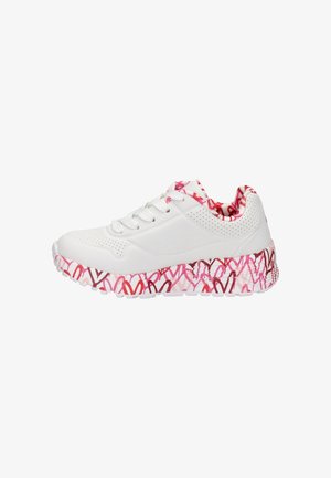 White sneaker with perforated upper, featuring a thick pink and red heart-patterned sole and a floral inner lining.