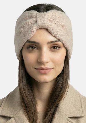 Lichtroze velours hoofdband met een twistontwerp, zachte textuur en glad oppervlak, geschikt voor dragen bij koud weer.