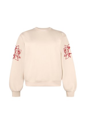 Beige longsleeve trui met rode bloemenmotieven op beide bovenmouwen en geribde boorden en zoom.