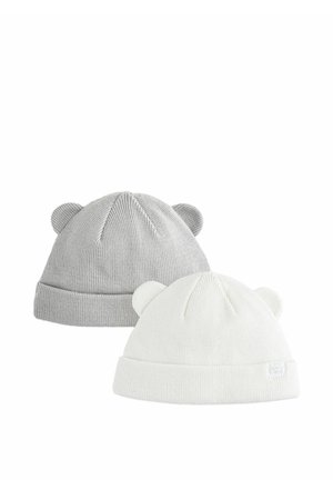 Two knit baby hats with small round ears, one light grey and one white, displayed on a white background.