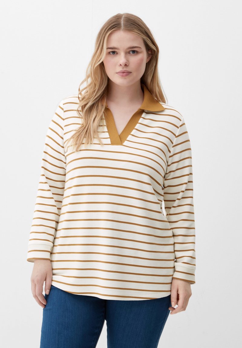 Striped long-sleeve polo shirt in cream and gold, featuring a V-neck and contrasting collar. Soft texture, relaxed fit.