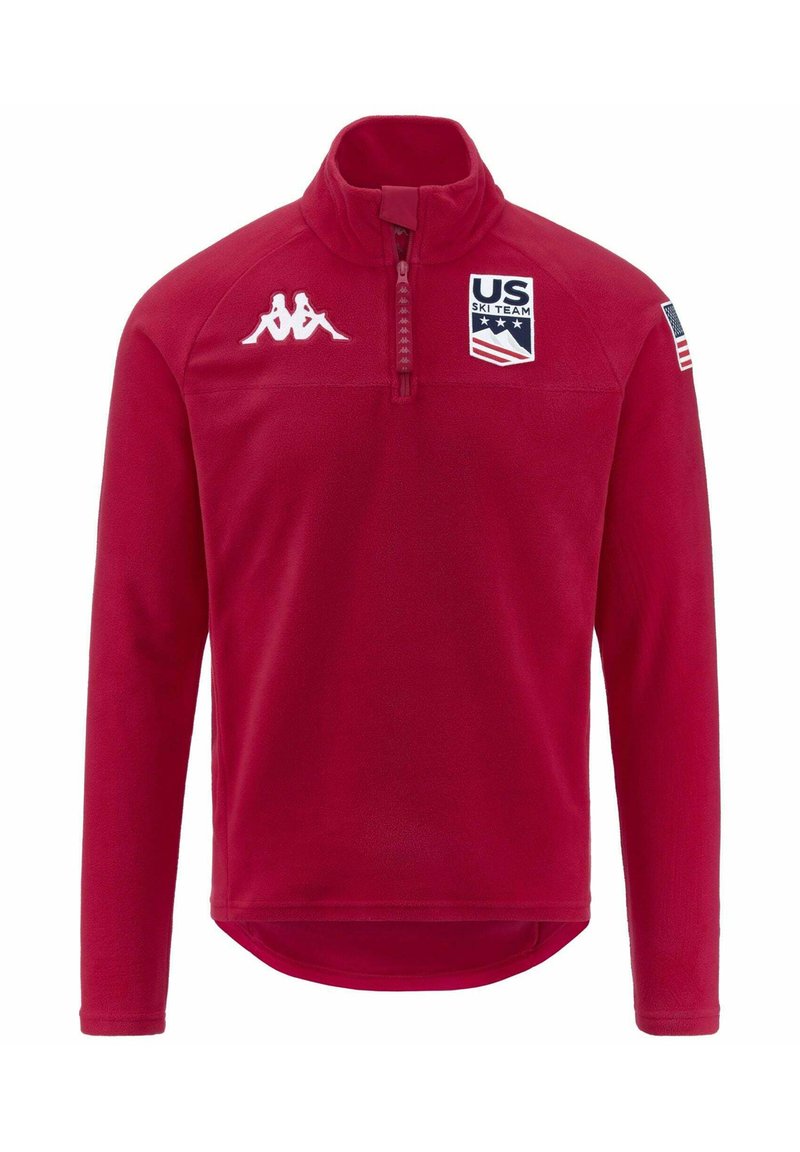 Pullover in pile rosso con zip a quarto di giro, logo Kappa bianco, patch della squadra olimpica di sci degli Stati Uniti e dettaglio con bandiera americana sulla manica. Tessuto liscio, maniche lunghe.