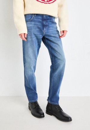 OSCAR - Jeans a sigaretta - rising tide