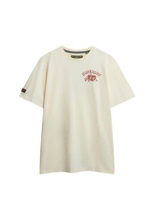 Off-white short-sleeve T-shirt with red "SUPERDRY" text and vintage truck graphic on chest and brand patch on left sleeve.