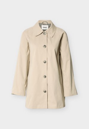 Beige trenchcoat med krage, knapper foran, to sidelommer og trekvartlange ermer; laget av glatt stoff.