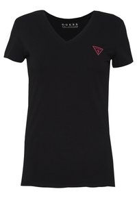 Czarna koszulka V-neck wykonana z bawełny. Posiada małe różowe trójkątne logo na lewej piersi. Krótkie rękawy, dopasowany fason, gładka tekstura.