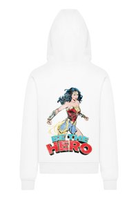 White hoodie featuring a graphic of a superhero with dark hair and a red and blue outfit, text reading "BE THE HERO" in bold colors.