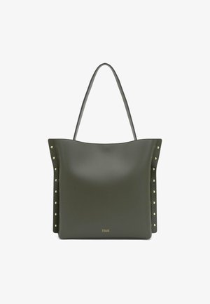 Bolso tote de cuero verde oliva con asas delgadas, lados con tachuelas y logo TOUS dorado en el centro inferior.