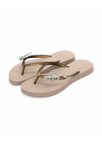 Des tongs marron avec une semelle beige texturée et des brides métalliques ornées d'un accent décoratif en forme de lézard, embellies de strass.