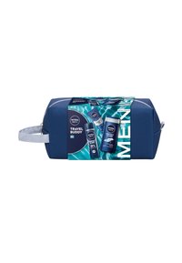NIVEA Men's travel bag in dark blue fabric with a silver handle. Front displays product labels and graphics featuring three grooming items.