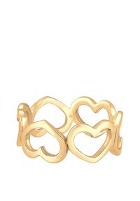 Gold ring featuring interconnected heart shapes, crafted in a smooth, polished metal. The design displays cut-out hearts around the band.