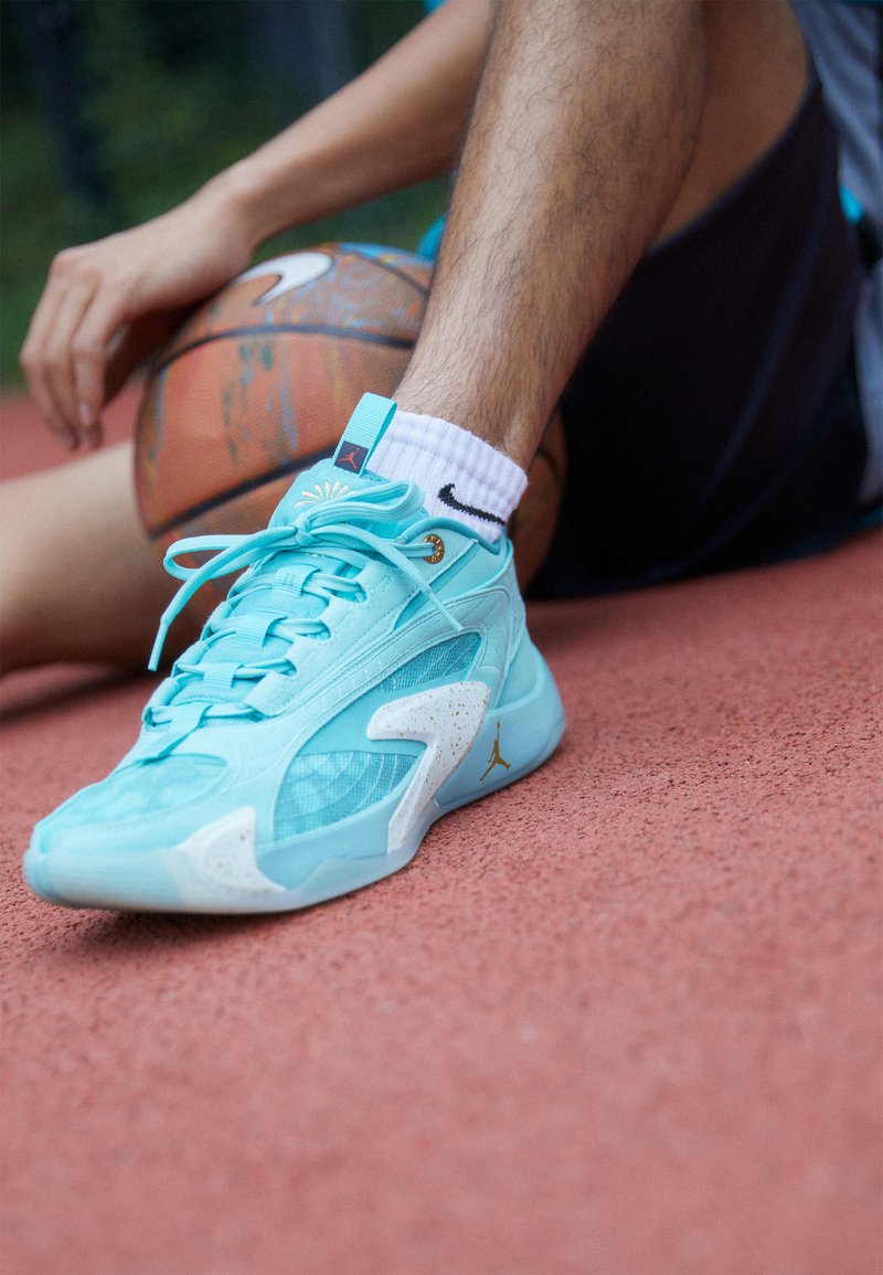teal green jordans