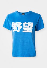 Blue cotton short-sleeve t-shirt featuring large white text on the front. Crew neckline with straight hem and visible stitching details.