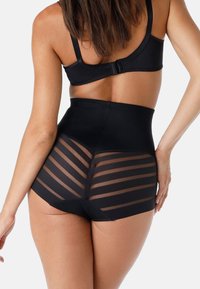 Shapewear nero a vita alta con pannelli a strisce trasparenti sul retro. Realizzato in materiale liscio ed elastico per comfort e sostegno.